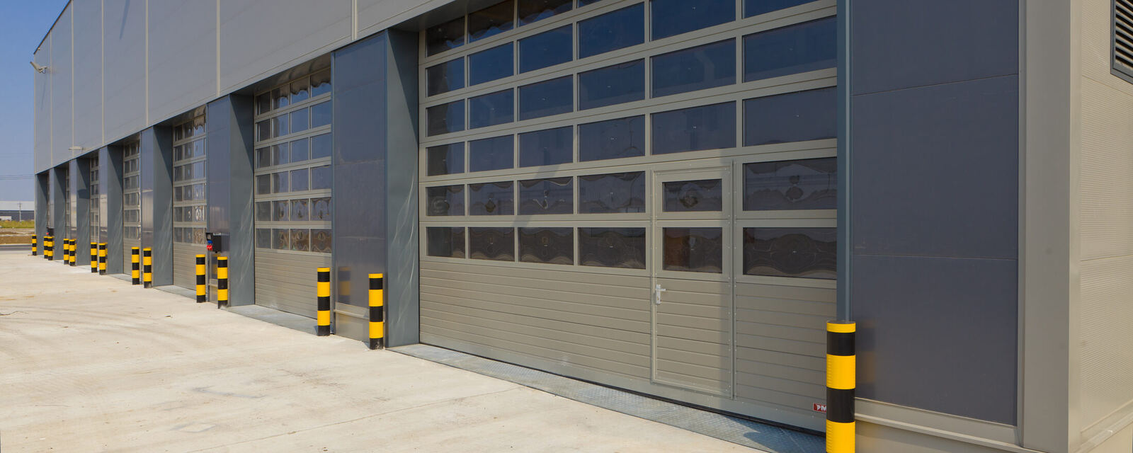 Sectional garage doors